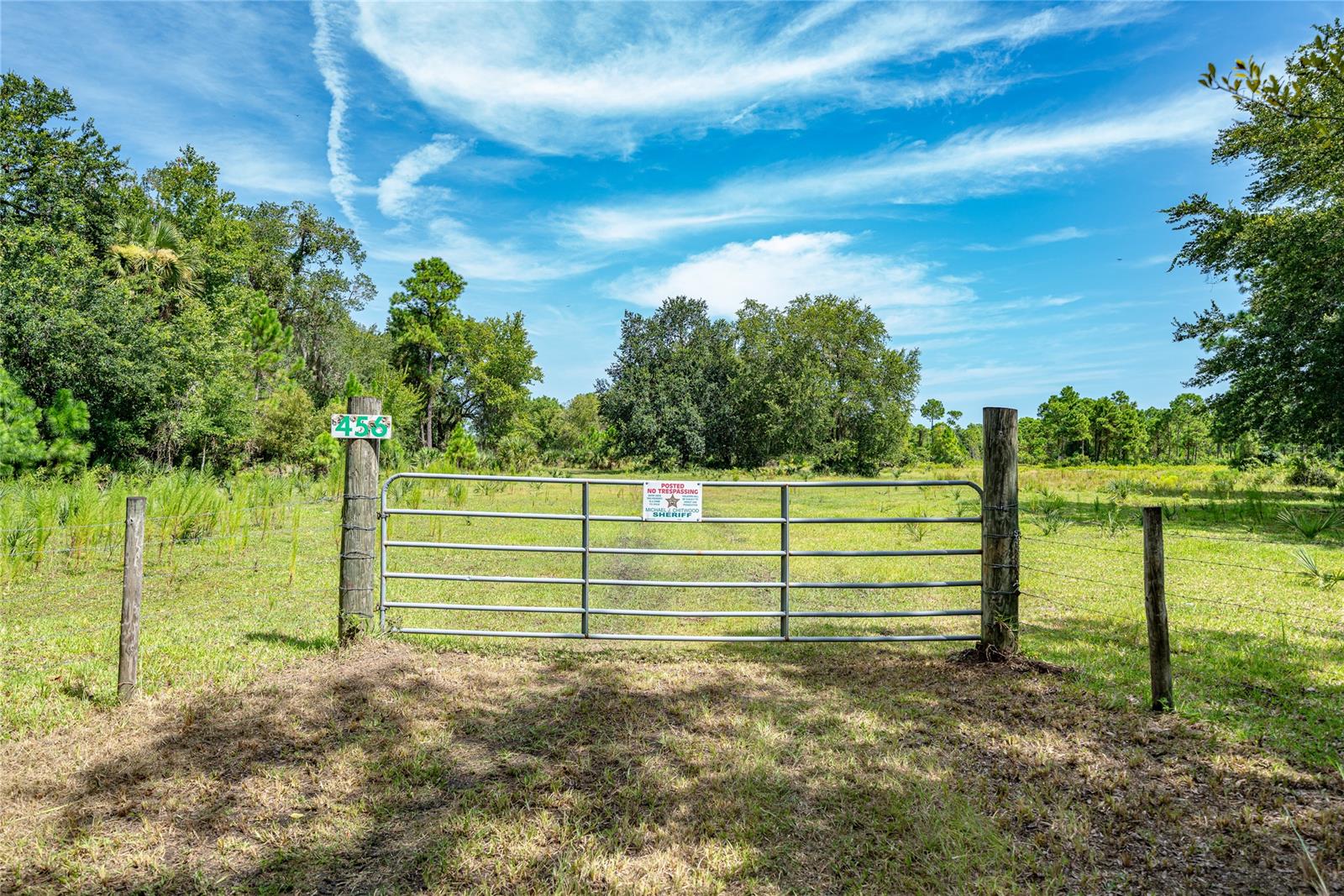 41.2 Acres of prime “old Florida ranch land. Partially cleared and fenced with beautiful mature Oak Trees. Located in the city of Oak Hill on a paved road. Zoning is A-1 and offers opportunities for potential subdivision of the land or just a large family compound. Enjoy some of the best fishing, shrimping and boating on the east coast of Florida. If you prefer the white beach sand and surfing, drive 30 min north to New Smyrna Beach. Easy access to shopping and dining. Note another 41.2 acres of land lies contiguous to this parcel and is also for sale.; Cleared: Partial