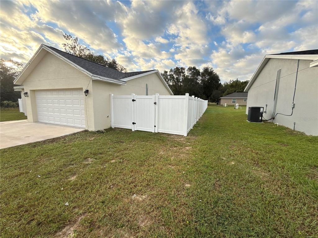 Photo of 294 Malauka Run, Ocklawaha, FL 32179 (MLS # O6354564)