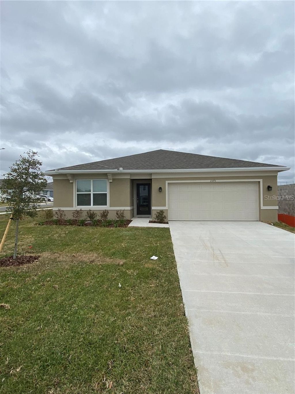 Photo of 1575 Aspen Avenue, Davenport, FL 33837 (MLS # O6370778)