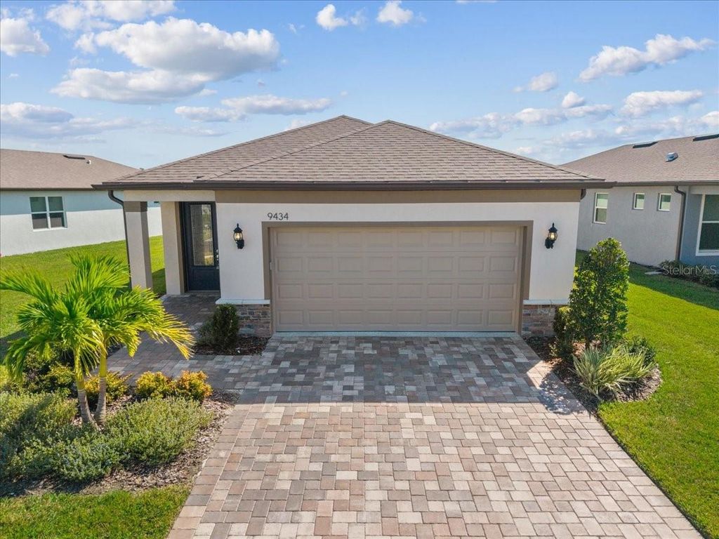 Photo of 9434 Ballaster Pointe Loop, Parrish, FL 34219 (MLS # A4670173)