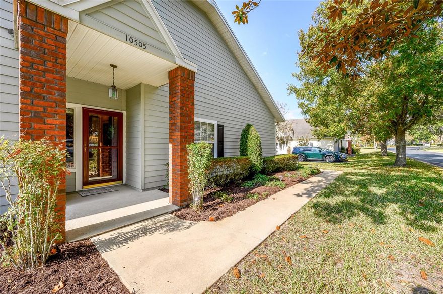 Maintenance free living in this spacious 3 bedroom 2 bath end unit with a 2 car garage. Kitchen has been updated with tall cabinets and granite countertops. Formal dining room. Large laundry room with sink, washer, dryer and extra cabinets. Master bedroom is oversized with walk in closet. Updated marble countertops in the bathroom which features stand up shower and soaker tub.  New roof. Back screened porch is perfect for entertaining. Community clubhouse and pool has a gym and a steam room. Convenient to I-75 and easy access to UF, Shands, the VA, grocery and nearby restaurants. HOA covers all exterior maintenance and lawn care.