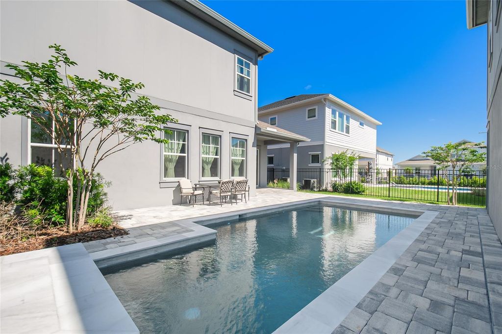 Photo of 10657 Marconi Avenue, Orlando, FL 32827 (MLS # O6401468)