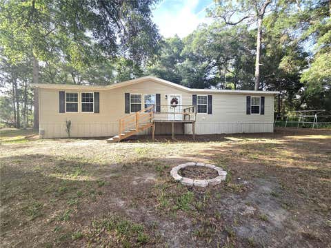 Photo of 18314 Deason Drive, Spring Hill, FL 34610 (MLS # TB8520999)