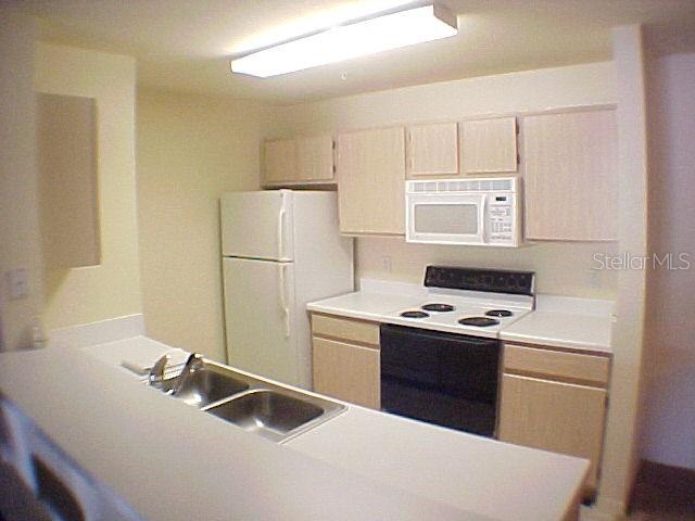 Photo of 5459 Vineland Road #4104, Orlando, FL 32811 (MLS # O6437881)