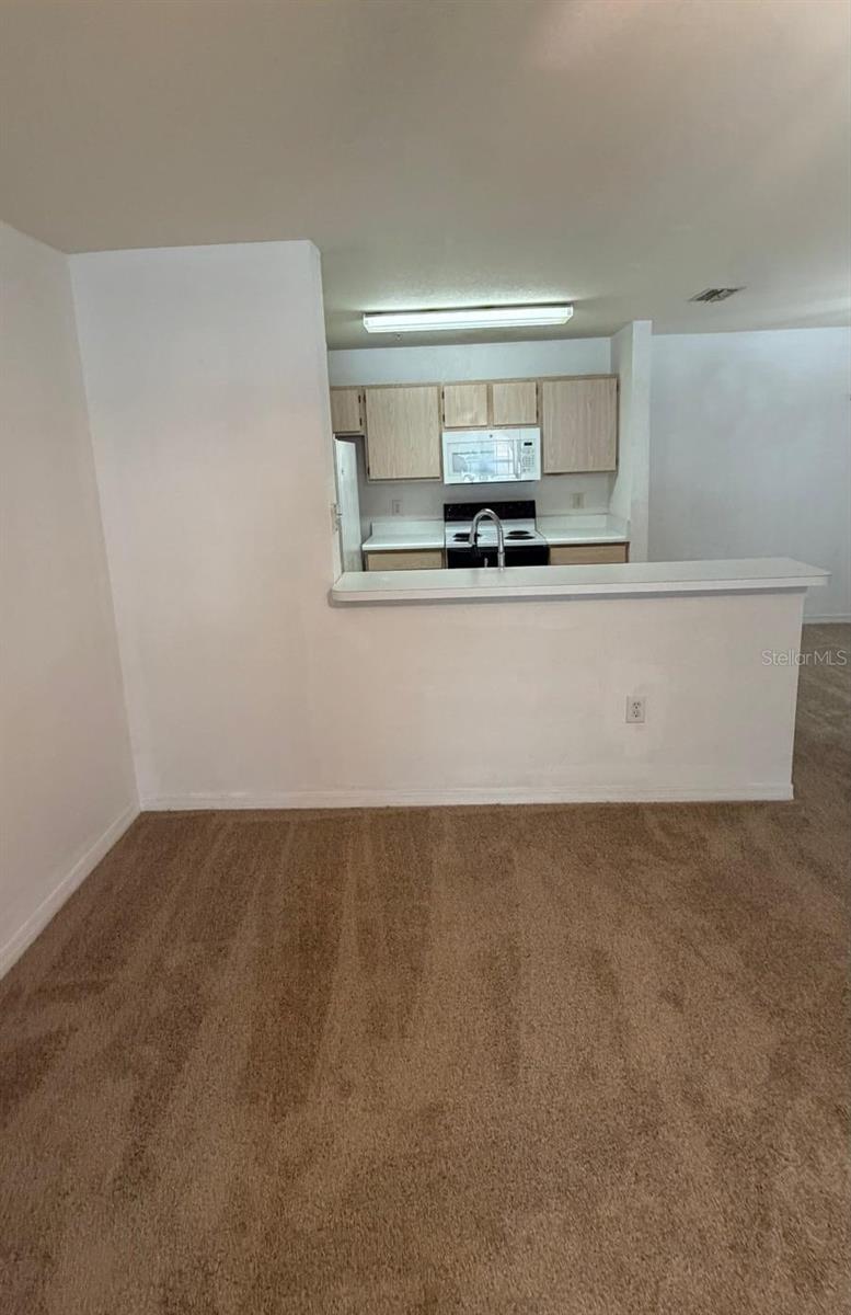 Photo of 5459 Vineland Road #4104, Orlando, FL 32811 (MLS # O6437881)