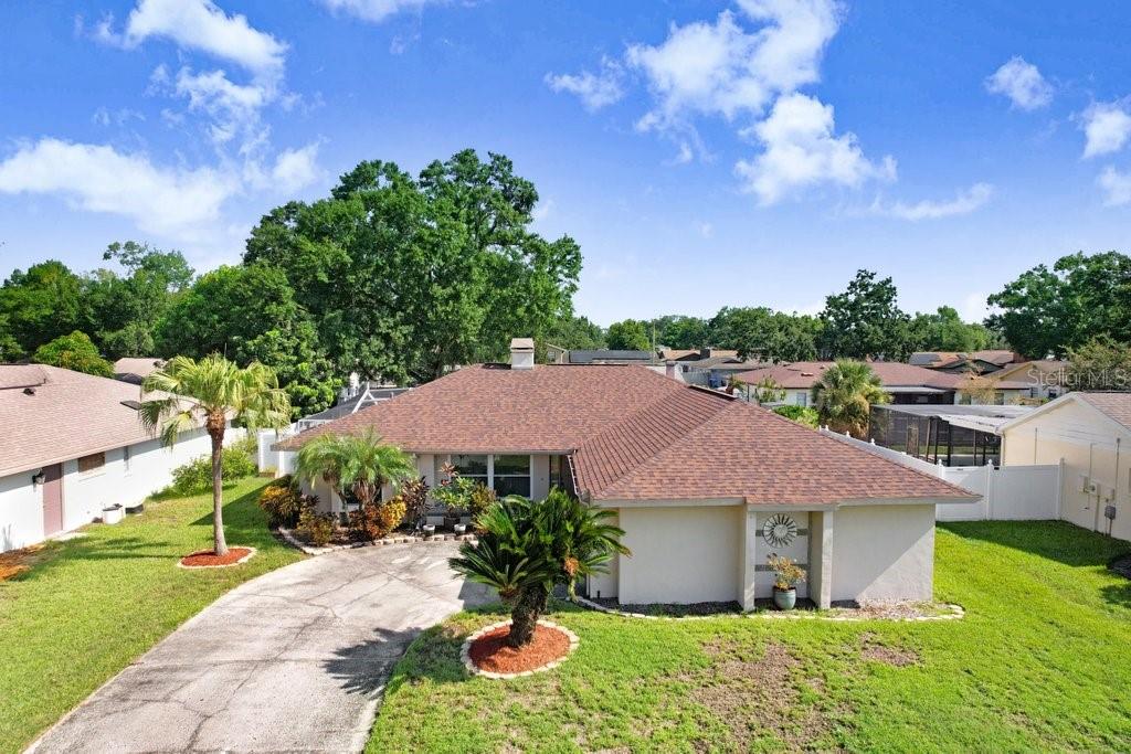 Ready to experience living in a quaint & beautiful neighborhood that is close to all the amenities that Brandon has to offer? This 3 bedroom, 2 bath, 2 car garage home with a sparkling pool has just what you're looking for! Upon entering the home, you are greeted by a vaulted ceiling & a two-sided fireplace that looks upon the spacious family room as well as the living area that's perfect for cozy nights. In the kitchen, you will find plenty of room for entertaining with its opening and airy space as well as a pantry, wine bar area, stainless steel appliances, and long counter for bar stools that provide extra seating. While preparing delicious meals you can look through the sliding glass doors while your guests are splashing around in the pool. With a split floor plan, the primary bedroom provides plenty of space for a king bed as well as an on-suite with double sinks with granite counter tops, sky light, and beautiful tiled shower with a seat as well as a laundry room nearby for convenience. The 2nd and 3rd bedroom provide privacy as they are located on the opposite side of the home with a private shower/bath convenient for family and friends.
Stepping outside you will find your own outdoor oasis, with plenty of room for grilling, entertaining and of course swimming in the screened-in pool.
This property offers many updates including a new roof in 2020, AC, hot water heater and water softener all 2 years old, as well as newer hurricane resistant impact windows.
Also, within walking distance, you will find a county park with playground and tennis courts for lots of family fun. Please call now for a private showing!