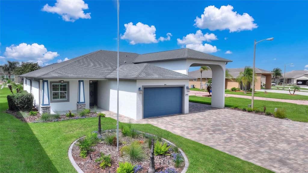 Photo of 716 Teaberry Trail, Polk City, FL 33868 (MLS # L4963437)