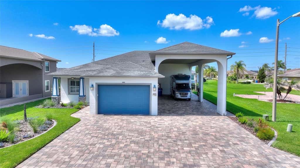 Photo of 716 Teaberry Trail, Polk City, FL 33868 (MLS # L4963437)