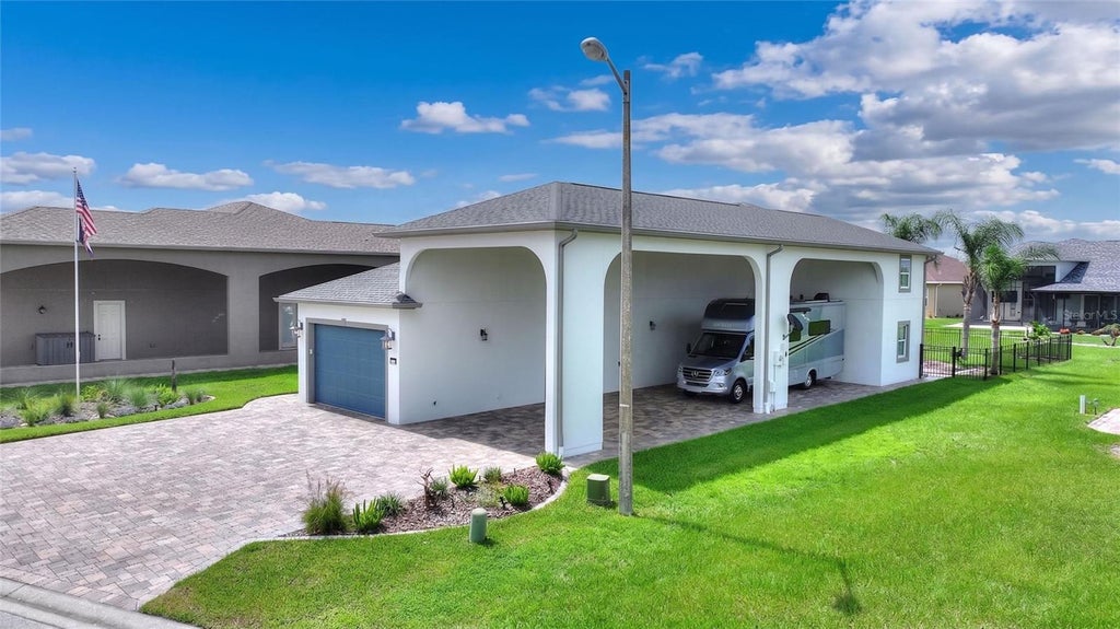 Photo of 716 Teaberry Trail, Polk City, FL 33868 (MLS # L4963437)