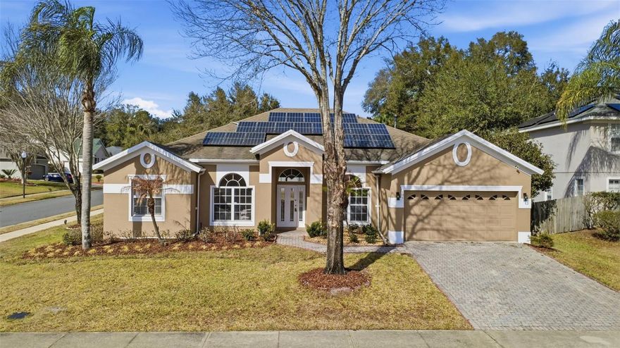 Welcome to this beautifully updated 4-bedroom, 2.5-bath single-family pool home located in the sought-after Crystal Cove community of DeLand. This move-in-ready residence features paid-off solar panels, offering energy efficiency and long-term savings for the next owner. Inside, enjoy fresh interior and exterior paint, new luxury vinyl plank flooring throughout most of the home, and updated light fixtures that create a bright, modern feel. The kitchen has been refreshed with new countertops, and the renovated primary bathroom offers a stylish, spa-like retreat. Step outside to your private backyard oasis featuring a sparkling pool, perfect for Florida living, entertaining, or relaxing year-round. Freshened landscaping enhances curb appeal and complements the outdoor space. With a functional floor plan, generous bedroom sizes, and thoughtful upgrades throughout, this home offers comfort, value, and convenience in a well-established neighborhood close to shopping, dining, and major roadways. Schedule your private showing today!