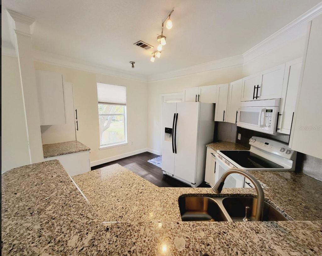 Photo of 8843 Villa View Circle #207, Orlando, FL 32821 (MLS # O6363877)