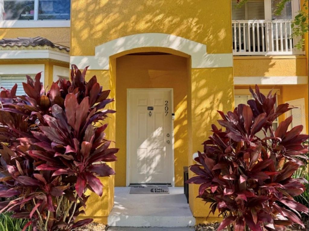 Photo of 8843 Villa View Circle #207, Orlando, FL 32821 (MLS # O6363877)