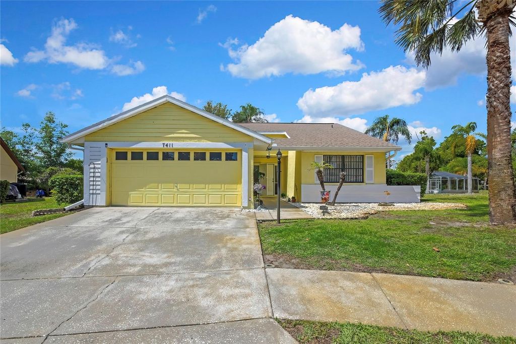 Photo of 7411 Baltusrol Drive, New Port Richey, FL 34654 (MLS # W7885291)