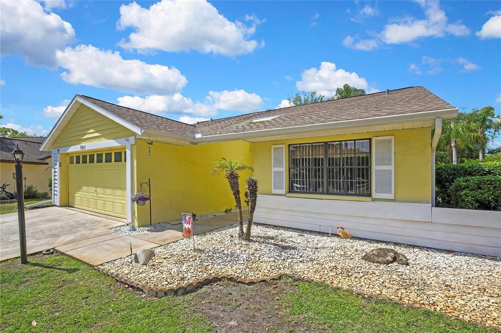 Photo of 7411 Baltusrol Drive, New Port Richey, FL 34654 (MLS # W7885291)