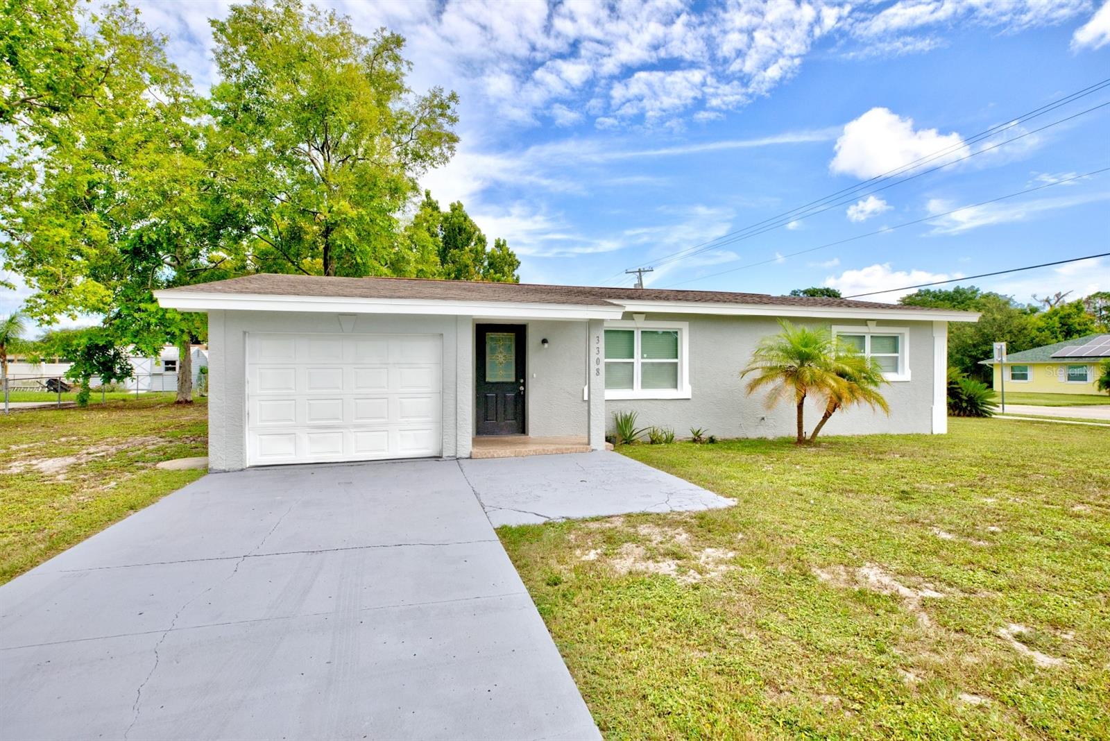 One or more photo(s) has been virtually staged. Move-in ready home located in Sebring Country Estates in Sebring, an all-ages, no HOA neighborhood close to everything. Enjoy quick access to shopping, restaurants, hardware stores, Walmart, and Hwy 27. This home sits on an oversized corner lot and features: 2 bedrooms and 1 full bathroom, an attached 1-car garage, a Roof installed in 2017, A/C updated in 2021, Windows have been replaced (not original), all tile flooring throughout, a Generous-size family room.m This home is ready for you now—don’t delay, come see your new property today. Some photos are virtually staged
