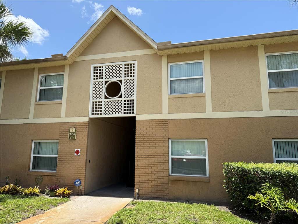 Photo of 9950 Turf Way #4, Orlando, FL 32837 (MLS # O6427767)