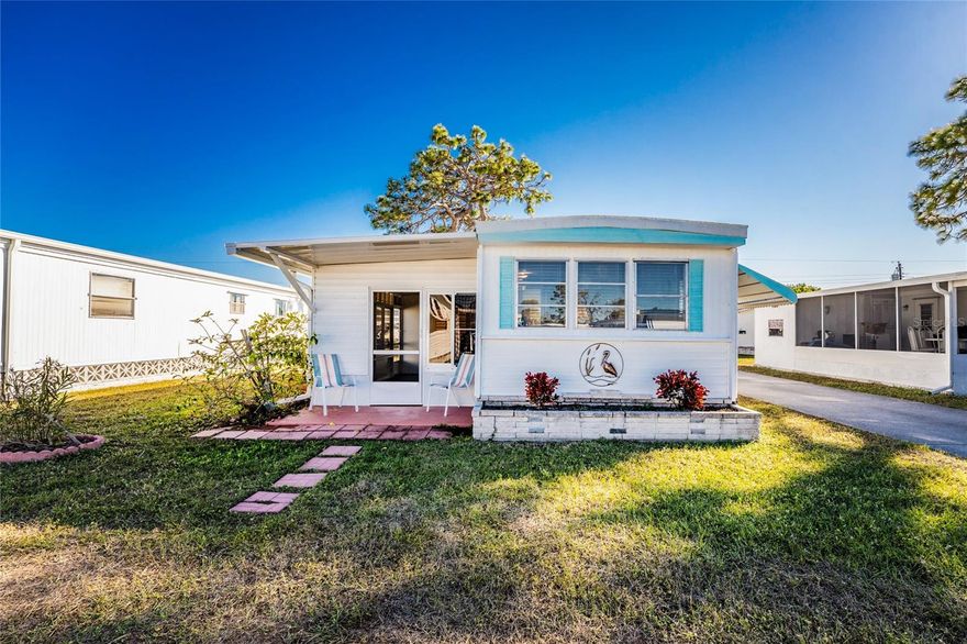Simplify life with this charming turnkey-furnished mobile home in the 55+ waterfront community of Brook to Bay in the X flood zone. If you love boating, Forked Creek runs alongside the community and offers access for small boats, jet skis, kayaks, and stand up paddleboards, leading out to the Intracoastal Waterway and the Gulf. Enjoy easy days on the water, trips to the sandbar, or fishing for your favorite saltwater catch. A small open-air patio welcomes you into the glass-enclosed Florida room and then into the well maintained, updated interior. The living room and kitchen are open and filled with natural light, with white cabinetry, blue countertops, and LVP flooring that give the space a relaxed coastal feel. The bedroom features two reach-in closets with a built-in dresser between them, offering great storage. The bathroom includes a walk-in shower and a newer cottage-style vanity with plenty of space to get ready for the day. Just off the Florida room is a nicely sized laundry area with a newer washer and dryer and a utility sink. Brook to Bay offers more than just a home, it offers a lifestyle. With low HOA fees, residents enjoy access to community docks, a pool, shuffleboard, and a clubhouse, so there is always something to do. Conveniently located between Englewood and Venice, you can bike less than four miles to Manasota Key Beach. A public boat ramp for larger boats is also nearby, along with several golf courses and pickleball courts. You are close to the growing Wellen Park community, where you can enjoy Atlanta Braves Spring Training games, Friday night concerts, and a variety of restaurants. Both Venice and Englewood also offer plenty of dining, shopping, and entertainment options. Snowbirds will love this affordable opportunity to escape the cold and enjoy Florida sunshine all winter long at 1891 Englewood Road #11.