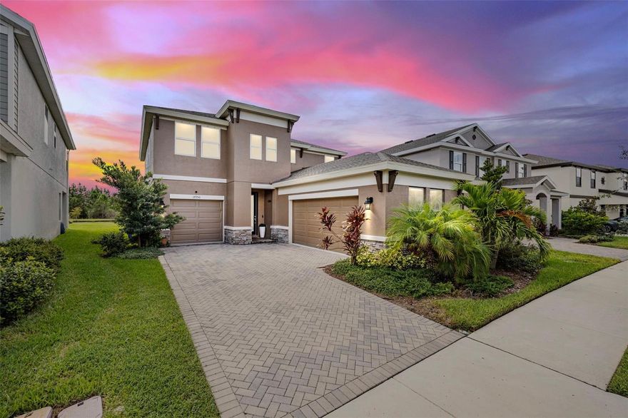 One or more photo(s) has been virtually staged. Welcome to 17750 Everlong—your chance to own one of Bexley’s most desirable homes, set on a premium WATER VIEW lot.  Built in 2023 by Homes by WestBay, this Ballast Point floor plan is a community favorite—known for its flexible design, striking curb appeal, and rare split 3-car garage (2 + 1).

Step inside and the water view steals the show— it’s the kind of instant wow only a premium lot delivers.  The main level flows seamlessly between the living room, dining area, and chef’s kitchen with quartz countertops, oversized island, and butler’s pantry—perfect for everything from weeknight dinners to big gatherings.

And the first-floor living spaces keep impressing: a private bedroom with full bath (ideal for in-laws or long-term guests), a versatile flex room for office or play, and a hidden bonus space tucked behind the dining room—a private spot perfect for quiet work, homework, or special projects. It’s one of those rare features that makes this home unique and unforgettable.

Upstairs, the owner’s suite is your private retreat with spa-like bath, oversized walk-in closet, and calming water views from every window. Two additional bedrooms and a huge bonus room complete the upper level, giving everyone space to spread out! 

Outside, the screened patio looks out across tranquil water— offering peaceful views, and the perfect backdrop for Florida living.

And then there’s Bexley itself: a community like no other, with resort-style pools, miles of trails and bike paths, dog parks, playgrounds, a fitness center, and the Twisted Sprocket Café right inside the neighborhood. Be sure to check out the Bexley Club and see what makes this place so special. With top-rated schools, The Hub at Bexley, and quick access to the Veterans Expressway, convenience is built in.

A nearly new build on a premium water-view lot with the coveted Ballast Point floor plan—one of Bexley’s finest. Don’t let it slip away.