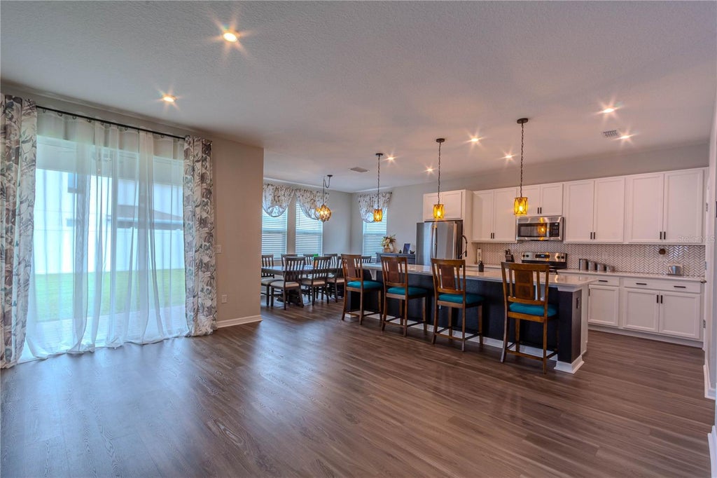 Photo of 1261 Lone Palm Way, Saint Cloud, FL 34771 (MLS # O6431277)