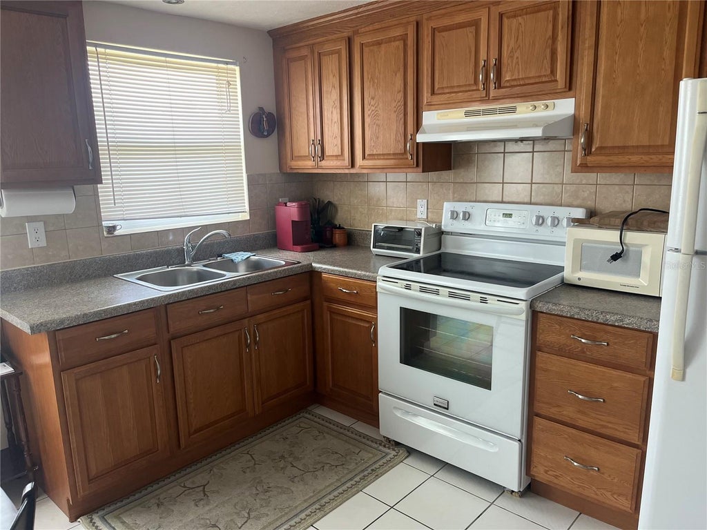 Photo of 1919 Forked Creek Drive, Englewood, FL 34223 (MLS # D6148756)