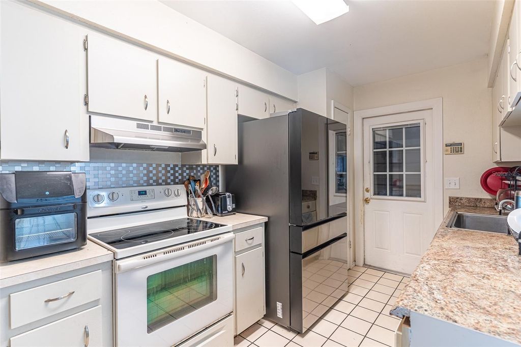 Photo of 6544 Calusa Drive, Lakeland, FL 33813 (MLS # L4959303)