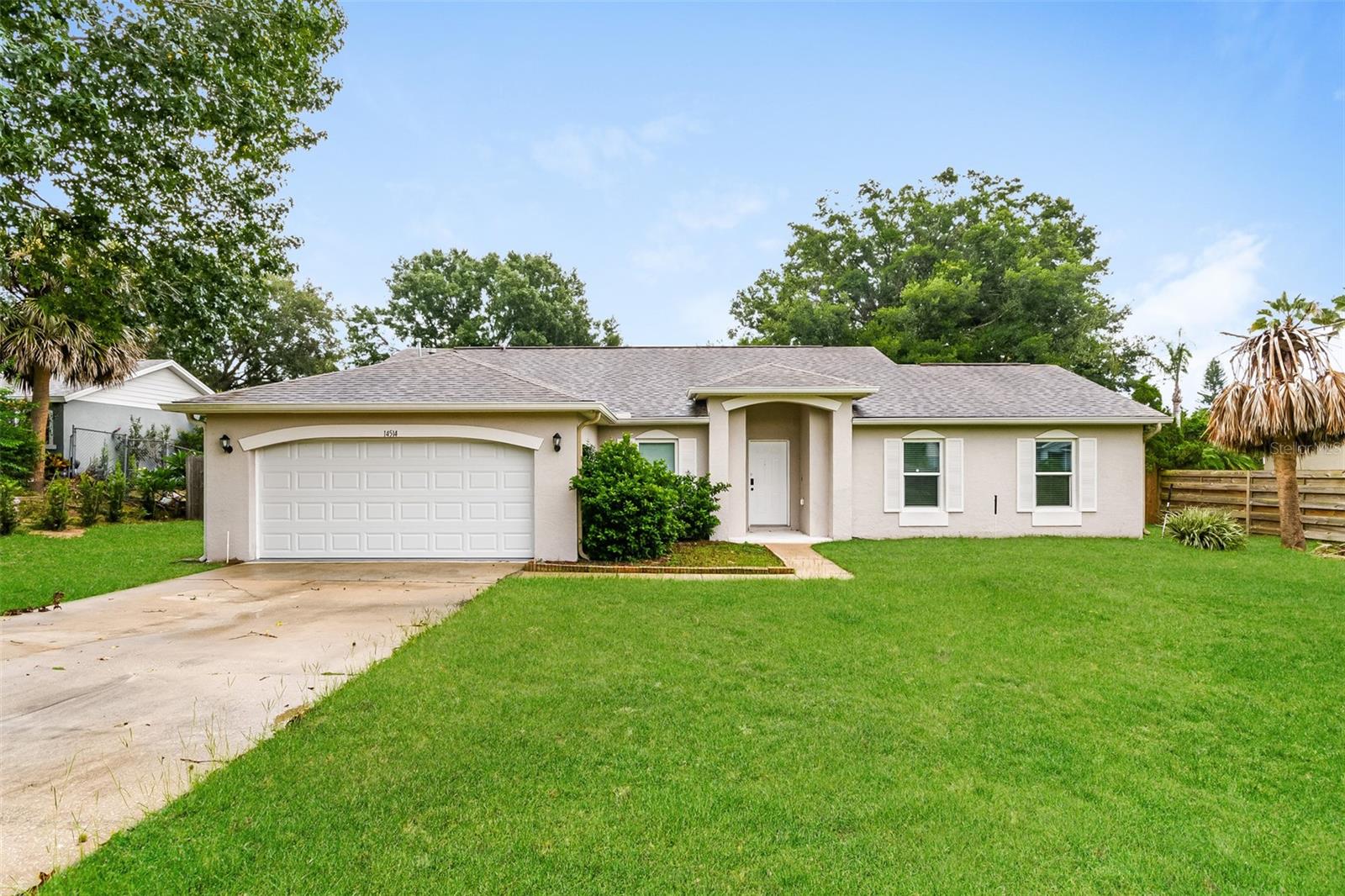 Charm and curb appeal abound for this Clermont home! Step inside into the inviting foyer and into the well-appointed living room, which is positioned at the center of the home. The kitchen boasts stainless steel appliances, hard surface countertops, ample storage and is adjacent to the family room. This ranch style floorplan features a primary suite, three secondary bedrooms, and a laundry room. Enjoy your screened in porch all year long! Come and see for yourself the possibilities that this home has to offer!