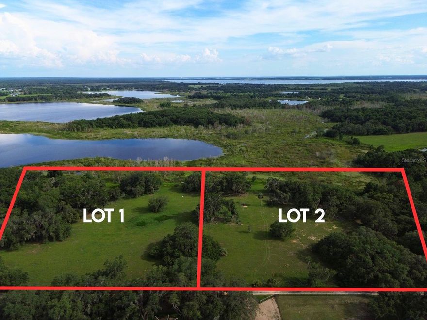 A beautiful 7-acre waterfront property at the end of a quiet dirt road awaits you in north Lake County.  Fully fenced with only 1 home further down the dirt road, this property is prime for those seeking land, water, and very few neighbors.  Surrounded by beautiful old-growth oaks, horses, cows, turkeys, and other animals, this one-of-a-kind property is level enough to make building easy. Sloped down toward the water, the property provides for long vistas and the beauty of a rolling landscape.  This property can be purchased as a single parcel, or you can buy both properties adjacent to each other on the same lake and have that much more privacy, waterfrontage, and land.  This property has a well and electricity already in place, as well as your very own frog pond! Come and feel the breeze, hear the quiet, and make it yours.