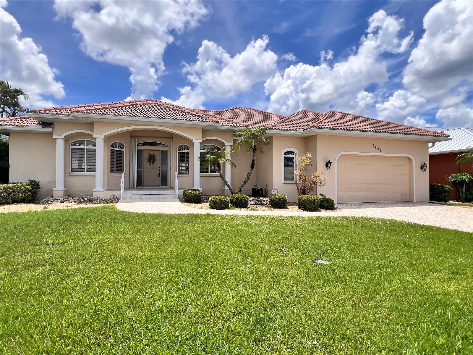 Seasonal or Annual rental!! Waterfront 3-Bedroom Rental in Seaman’s Point – Sailboat Access! Located in the desirable Seaman’s Point community, this custom-built 3-bedroom, 2-bath home offers direct sailboat access to beautiful Charlotte Harbor and the Gulf of Mexico—ideal for boating, fishing, kayaking, and canoeing right from your private dock. Built in 2000, this spacious home offers 3,267 square feet of living space. A grand double-door entry opens into a welcoming foyer and expansive great room. The open-concept kitchen features a breakfast bar, breakfast nook, and stunning waterfront views. The private primary suite is a true retreat with dual walk-in closets, split vanities, a soaking tub, and a separate walk-in shower. Enjoy year-round indoor-outdoor living with a Florida room overlooking the water, which flows seamlessly into the screened-in pool and spa area. The home also includes an inside laundry room and an attached two-car garage with a stamped concrete driveway. Lush, professional landscaping creates a serene outdoor oasis. Conveniently located just a short drive from shopping, dining, golf, tennis, pickleball, downtown Punta Gorda, Port Charlotte, Sarasota, Fort Myers, and all that Southwest Florida has to offer.