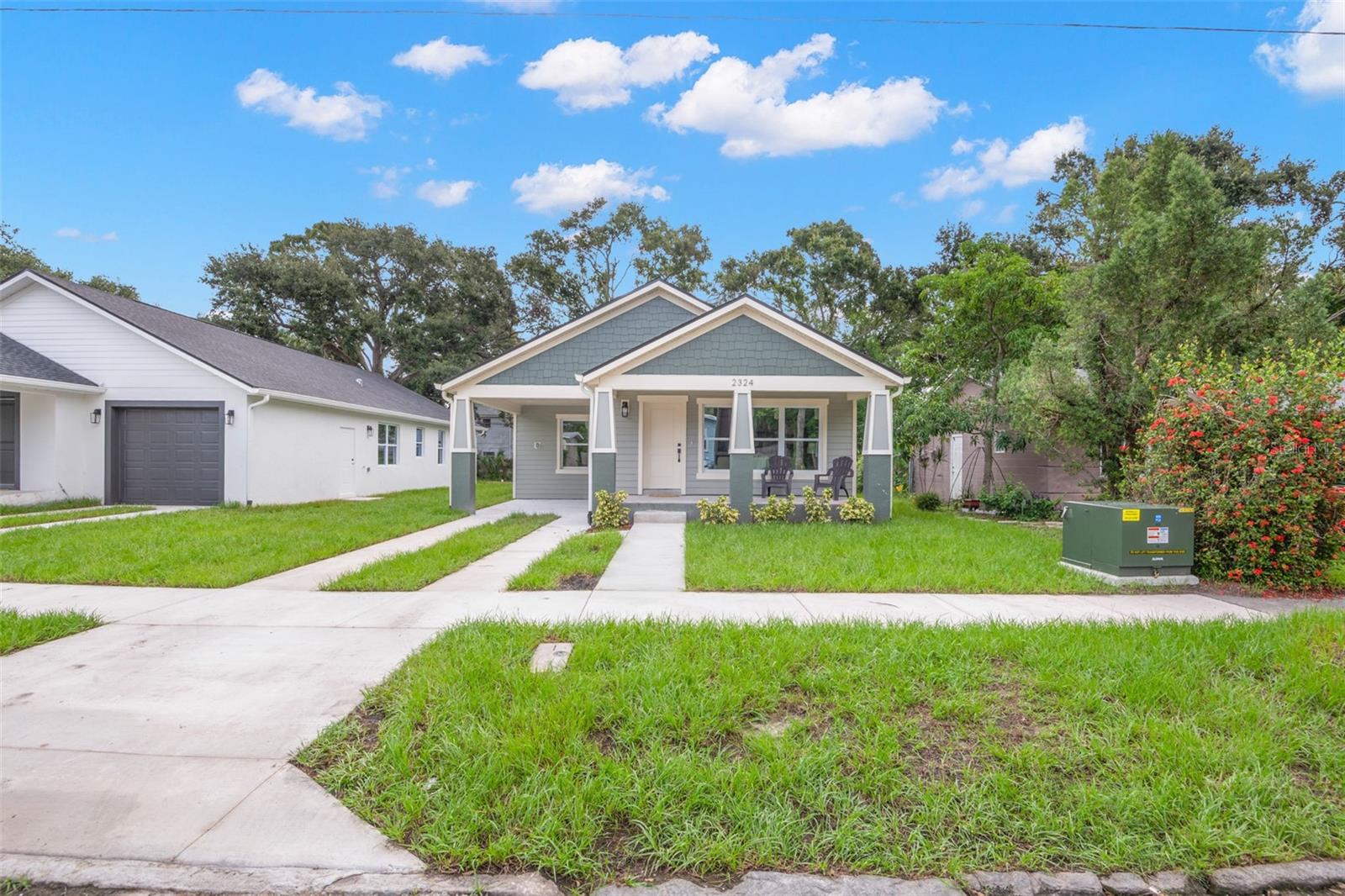 New construction in St. Petersburg! This charming 3-bedroom, 2-bath home is ideally located near Lake Maggiore and downtown St. Pete. The open floor plan creates a bright, welcoming space, and the master bedroom features a private en-suite bathroom for added comfort. Two additional bedrooms offer flexible options for guests or a home office. Enjoy the convenience of a covered carport and the peace of mind that comes with new construction. Perfect for those seeking style and convenience in a prime location!
