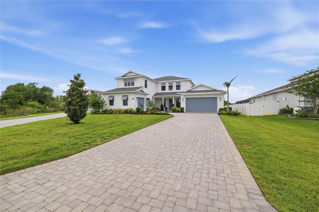 Photo of 2340 White Dogwood Loop, Lutz, FL 33549 (MLS # TB8518413)