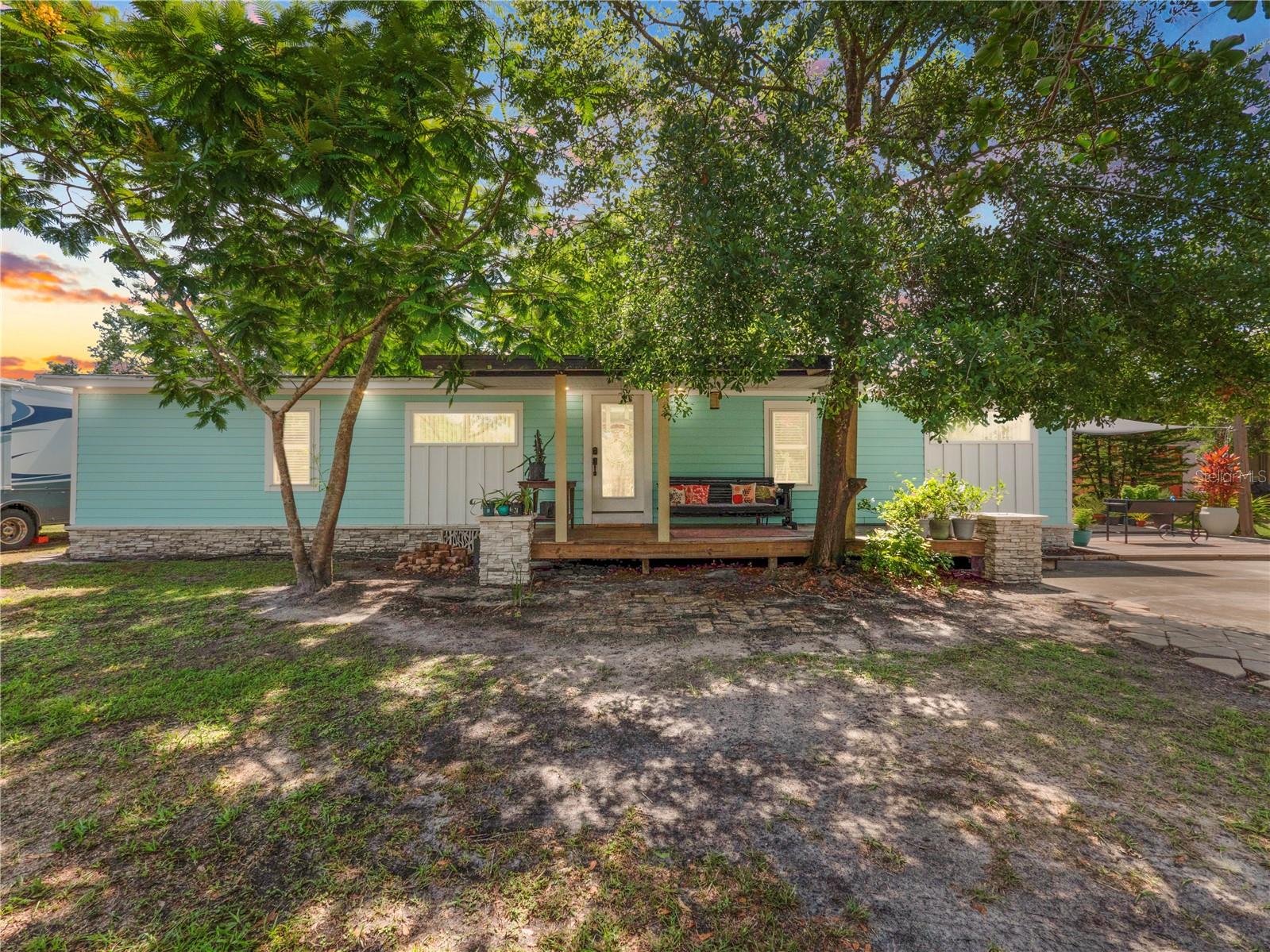 Welcome to your dream home! This exquisite 3-bedroom, 2-bathroom split plan home is nestled on over an acre of beautiful, fully fenced land, providing you with the utmost privacy and tranquility. Boasting a charming front porch and a spacious back porch, this home offers the perfect spots to relax and enjoy the serene surroundings. As you step inside, you'll be greeted by a meticulously updated interior that showcases the best in modern living. The kitchen is a true masterpiece, featuring sleek countertops, top-of-the-line appliances, large island and ample cabinetry. The large pantry provides abundant storage space for all your culinary needs, ensuring you have everything within arm's reach.Both bathrooms have been tastefully renovated, exuding a sense of luxury and elegance. From the stylish fixtures to the contemporary finishes, these bathrooms offer a serene retreat where you can unwind after a long day. The whole home is adorned with new windows, allowing an abundance of natural light to flood the rooms and create a warm, inviting ambiance. The fresh, new vinyl plank flooring adds a touch of sophistication to every step you take. An inside utility room adds convenience and practicality to your daily routines. One of the highlights of this property is the above ground pool, complete with a deck that is perfect for lounging and entertaining. Imagine hosting unforgettable pool parties or enjoying a refreshing swim on hot summer days. Additionally, an outdoor storage shed offers ample space to keep your gardening tools, outdoor furniture, and more. For those who appreciate the purest form of water, this home boasts a well water filtration system that ensures clean and refreshing water throughout the property. Say goodbye to the inconveniences of municipal water and enjoy the benefits of a reliable and efficient well system. The roof over is less than 5 years old, and the septic has been regularly maintained. With updated tie-downs, this home provides enhanced stability and peace of mind. Located in a desirable neighborhood, this home offers a peaceful and idyllic setting while still being conveniently close to schools, shopping centers, and major transportation routes. Don't miss this incredible opportunity to own a thoughtfully updated home with all the amenities you desire. Schedule a showing today and envision yourself living the life you've always dreamed of in this exceptional property.