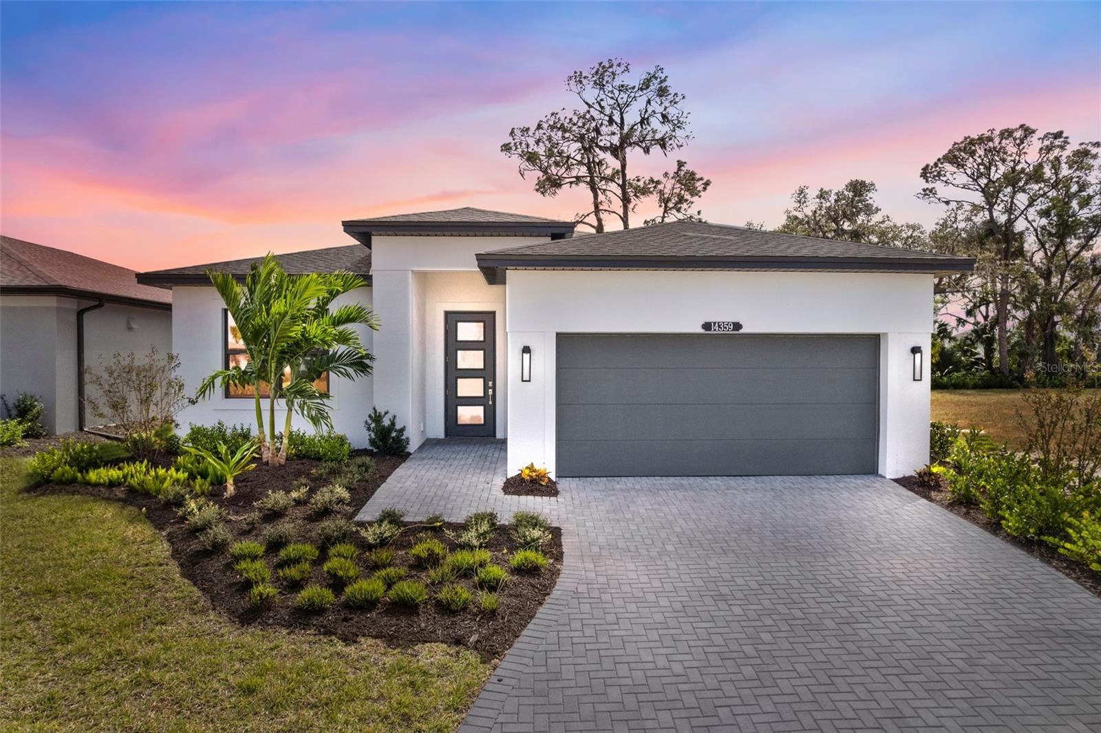 ***NEW CONSTRUCTION*** Welcome to this beautifully designed Jade floorplan home, thoughtfully crafted for both style and functionality. At the heart of the home, the Chef’s Kitchen serves as the command center, a dream come true for culinary enthusiasts. It features an abundance of countertop space, premium cabinetry, high-end appliances, and a generous pantry, all designed to make meal preparation a joy. The spacious island overlooks the light-filled Dining area and Great Room, where a stunning 16-foot-wide, 8-foot-tall sliding glass door seamlessly connects the indoors to the covered Lanai, perfect for entertaining or relaxing in the Florida sunshine.
The Owner’s Suite is a true retreat, featuring an elegant tray ceiling, an expansive walk-in closet, and a luxurious Owner’s Deluxe Extended Shower with separate vanities for added comfort and convenience. Practical upgrades such as a 4-foot garage extension provide extra storage or workspace, while the laundry area is ready with a rough-in for a future laundry tub. A thoughtfully placed floor outlet in the Great Room adds flexibility for furniture arrangements and everyday living.
This home blends everyday functionality with luxurious design, offering an inviting, open-concept layout that perfectly balances comfort, sophistication, and convenience.