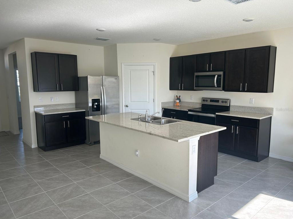 Photo of 33518 Elm Hill Branch, Wesley Chapel, FL 33545 (MLS # TB8453593)