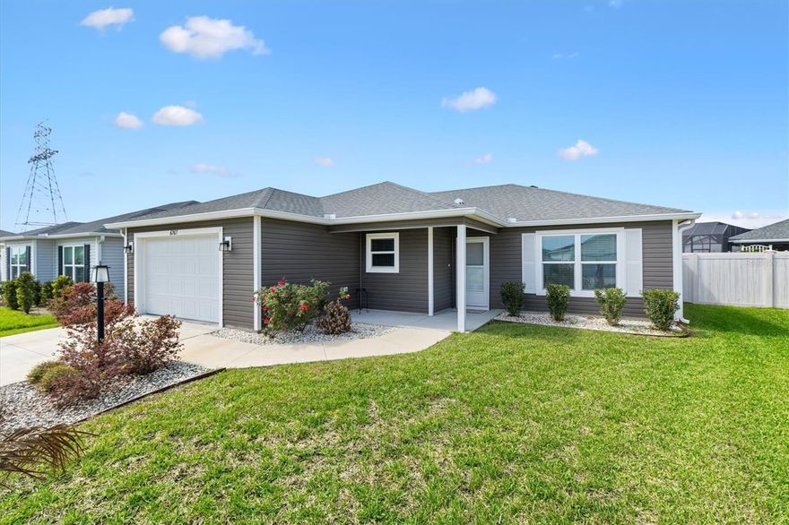 TURNKEY + WATER VIEW + PRIVACY - RARE FIND!  Enjoy easy Florida living in this 3-bedroom, 2-bath Sandpiper-style cottage villa located in the desirable Village of Newell in The Villages. Offered turnkey, this home is move-in ready and perfectly suited for full-time living, seasonal enjoyment, or investment. Inside, you’ll find an open split-bedroom floor plan with high ceilings and attractive luxury vinyl flooring in the living areas and bathrooms, creating a bright and spacious feel. The well-appointed kitchen features gas appliances, ideal for those who enjoy cooking, and flows seamlessly into the main living and dining areas. The primary suite offers a private retreat with an en suite bath, including a walk-in closet and a thoughtfully designed layout with the shower and toilet in a separate area for added privacy. Two additional bedrooms provide comfortable space for guests or a home office. Take in the tranquil water view from the glass-enclosed lanai with tile flooring and full-length stacking sliders that open to an adjoining patio—perfect for relaxing or entertaining. The sliders allow you to open the space to enjoy Florida’s beautiful weather year-round. Beyond the lanai, and patio area, the fully fenced backyard provides exceptional privacy and additional outdoor living space with room for a pool. Ideally situated near Sawgrass Market, Ezell Recreation Center, and Southern Oaks Championship Golf Course, this home offers convenient access to shopping, dining, golf, and entertainment. You’re also just a short drive from the town squares, with nearby medical facilities and everyday conveniences, all while enjoying a peaceful residential setting.