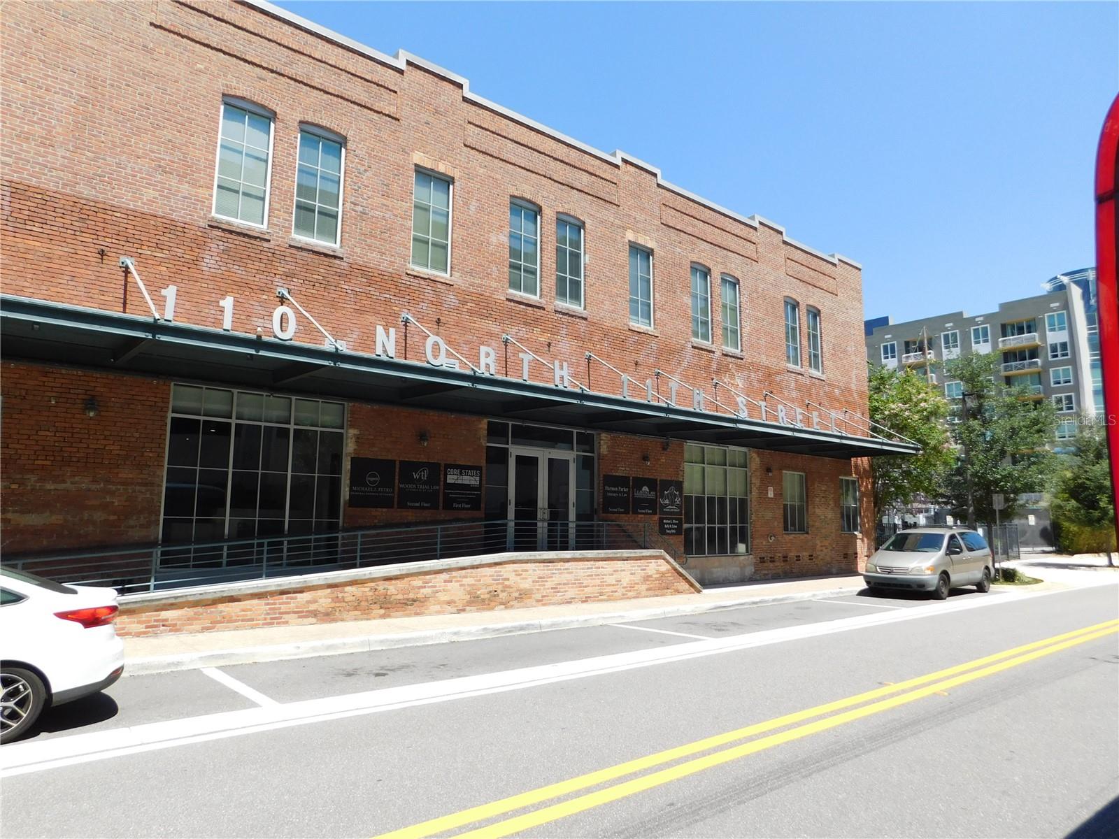 Full service professional office space being offered in a historic office building in the heart of the Channelside area. The office is located on the located on the second floor on the SE corner and it has 12-foot ceilings, other tenants are Law offices and other professionals. The office measures 9.5' x 16'. Shared areas include a Reception Area, Restrooms, Break Room, Medium Conference Room and Large conference Room. This is a unique location in the center of all the new growth that is happening in the Channelside area that is walking distance to Amalie Arena, Sparkman's Wharf, the Cruise Port and Riverwalk. Also, right across from the office there are three generous sized workstations measuring 8' x 14' that are available to accompany the office that is for rent at $450 each per month for your office staff. The office space is furnished with a desk and chairs with an on-site owner in the building. Tenants get access to the kitchen and bathroom. The shared break room has a refrigerator, coffee machine, and microwave.