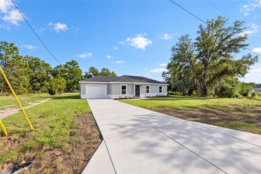 Photo of 19 Locust Loop Lane, Ocala, FL 34472 (MLS # OM734967)