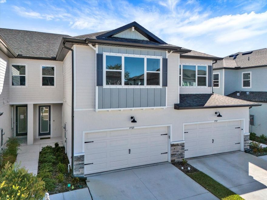 MOVE-IN READY BRAND-NEW 3BR/2.5BA TOWNHOUSE WITH MODERN LUXURY THROUGHOUT! This brand-new, move-in ready townhome features a bright, open floor plan with white designer kitchen cabinetry, quartz countertops, and luxury vinyl plank flooring throughout the first floor. Large windows and 8’ sliding glass doors flood the space with natural light, creating a warm and welcoming atmosphere. The staircase, finished with solid oak treads and black aluminum balusters, adds an elegant touch as it leads to the second floor. Upstairs, the primary suite is spacious and filled with natural light, featuring a WALK-IN CLOSET and a luxury ensuite with quartz countertops and dual undermount sinks. Secondary bedrooms are generously sized, providing comfort for family or guests. Located in a low-traffic, peaceful neighborhood, this home comes with builder warranties and offers modern, turnkey living for immediate occupancy. ULTRA LOW HOW DUES OF JUST $253/MONTH include exterior lawn maintenance, roof, pest control and more! Schedule your showing today — this home is ready for you now!