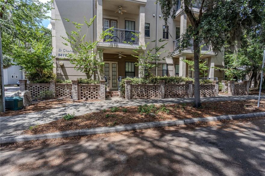 Walk to University of Florida, Ben Hill Griffin Stadium, and Midtown from this fully furnished top-floor condo at St. Charles Condominiums! Featuring a spacious two-story layout, private bedroom suites, and upscale finishes, this home offers comfort and convenience in a prime location. The condo includes two large bedroom suites with private en suite bathrooms & walk-in closets, plus a flex room off the kitchen, ideal for an office or guest space, & a full third bathroom. The updated kitchen flows into the open living area with stainless steel appliances, upgraded countertops, and a breakfast bar. French doors open to a charming New Orleans-style covered balcony, perfect for relaxing or entertaining. Elevator access and a reserved garage parking space are included. Enjoy walkable access to campus, dining, shopping, and nightlife.