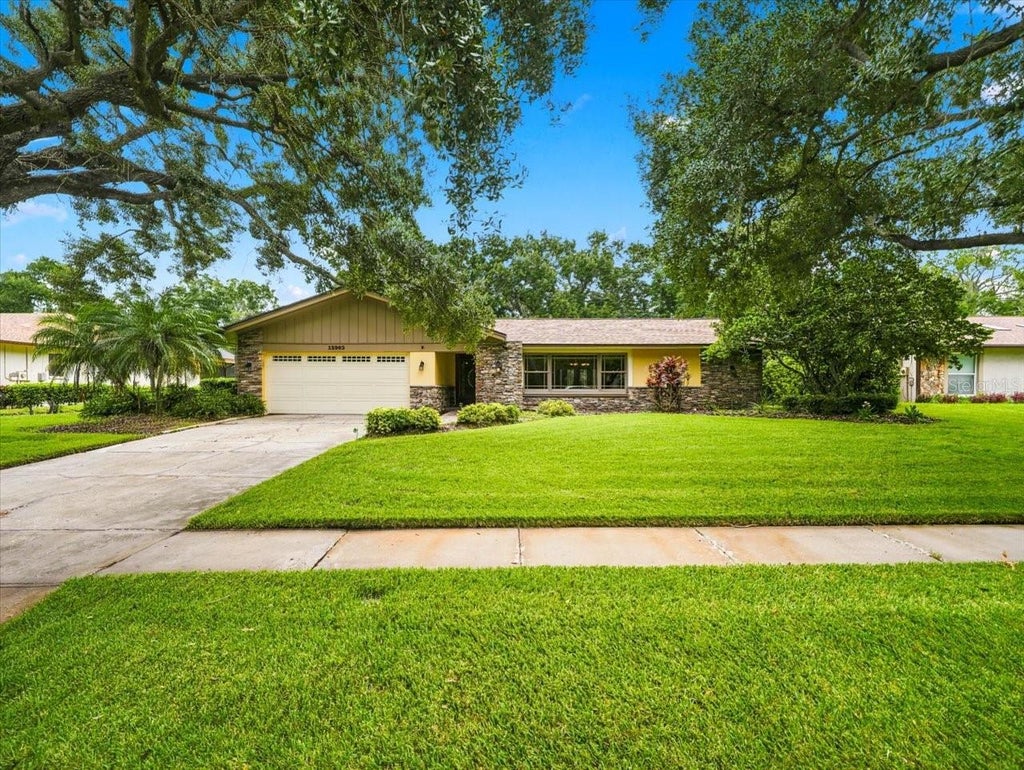Photo of 13903 Middle Park Drive, Tampa, FL 33624 (MLS # TB8551440)