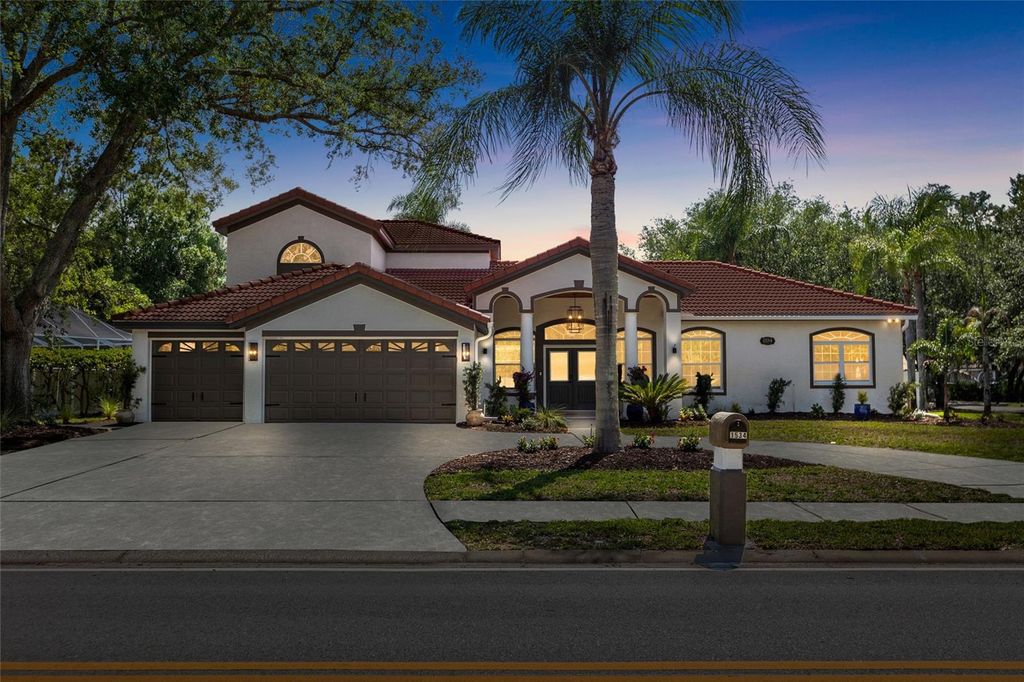 Photo of 1534 E Lake Woodlands Parkway, Oldsmar, FL 34677 (MLS # TB8509589)