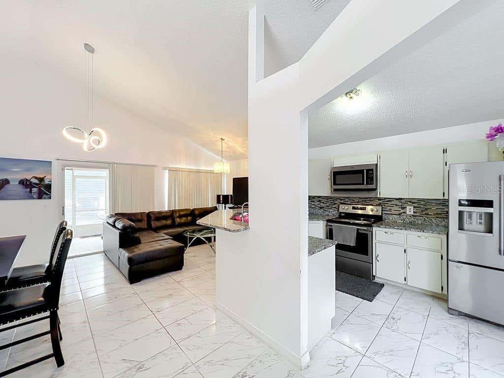 Photo of 3549 Spring Land Drive, Orlando, FL 32818 (MLS # O6431585)