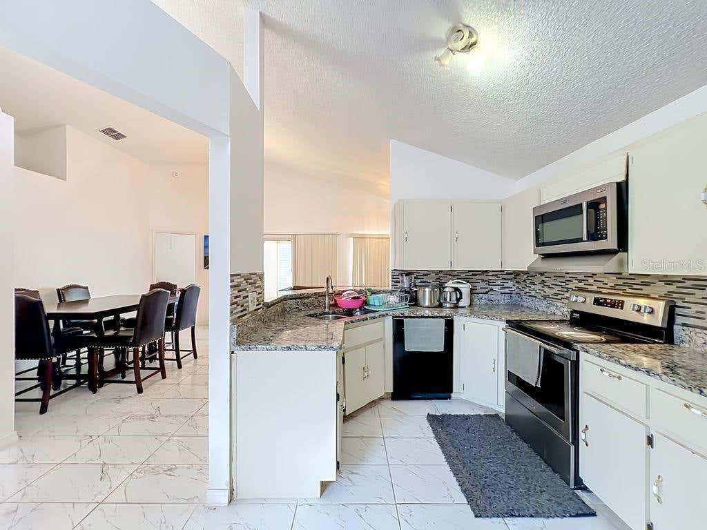 Photo of 3549 Spring Land Drive, Orlando, FL 32818 (MLS # O6431585)