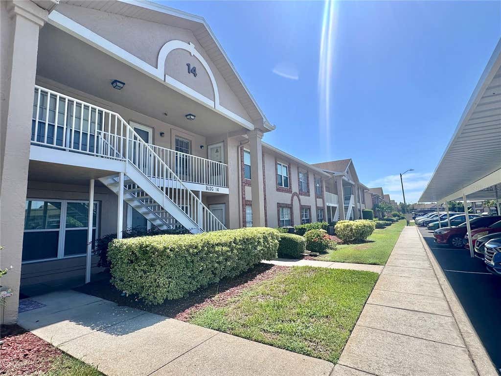 Photo of 6440 Spring Flower Drive #12, New Port Richey, FL 34653 (MLS # TB8528195)