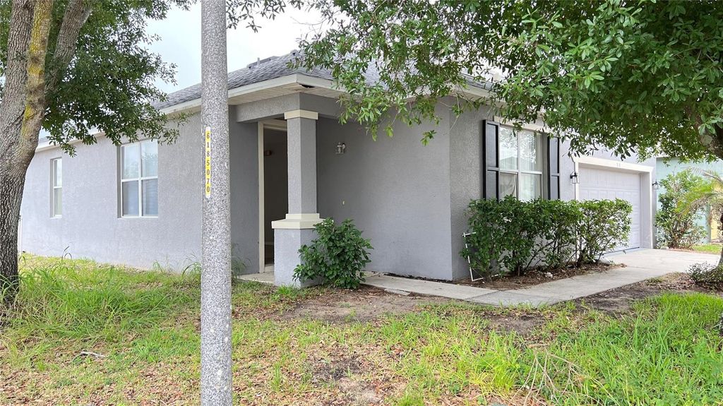 Photo of 318 Sand Ridge Drive, Davenport, FL 33896 (MLS # S5150229)