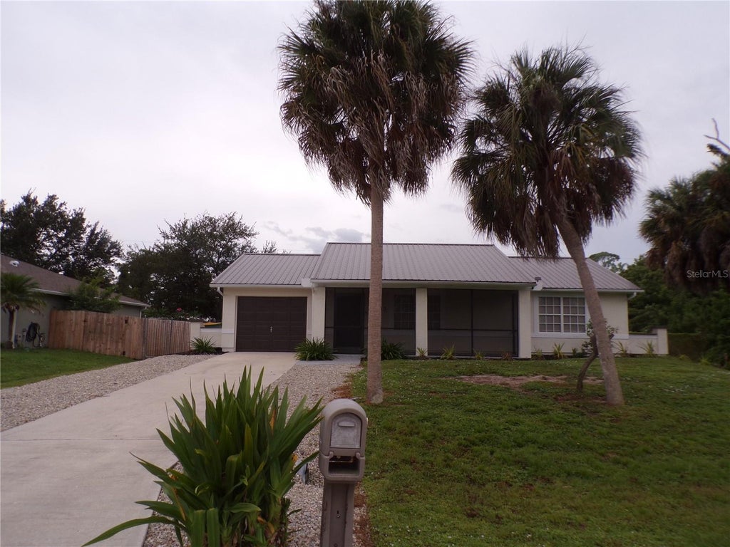 Photo of 18083 Regan Avenue, Port Charlotte, FL 33948 (MLS # C7531442)