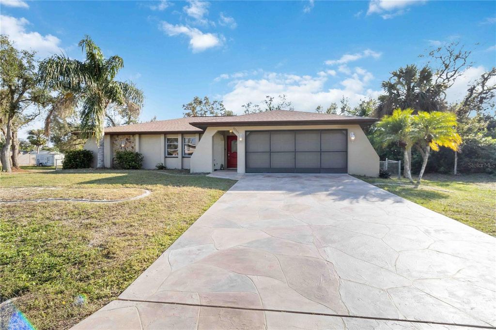 Photo of 22285 Walton Avenue, Port Charlotte, FL 33952 (MLS # OM717081)