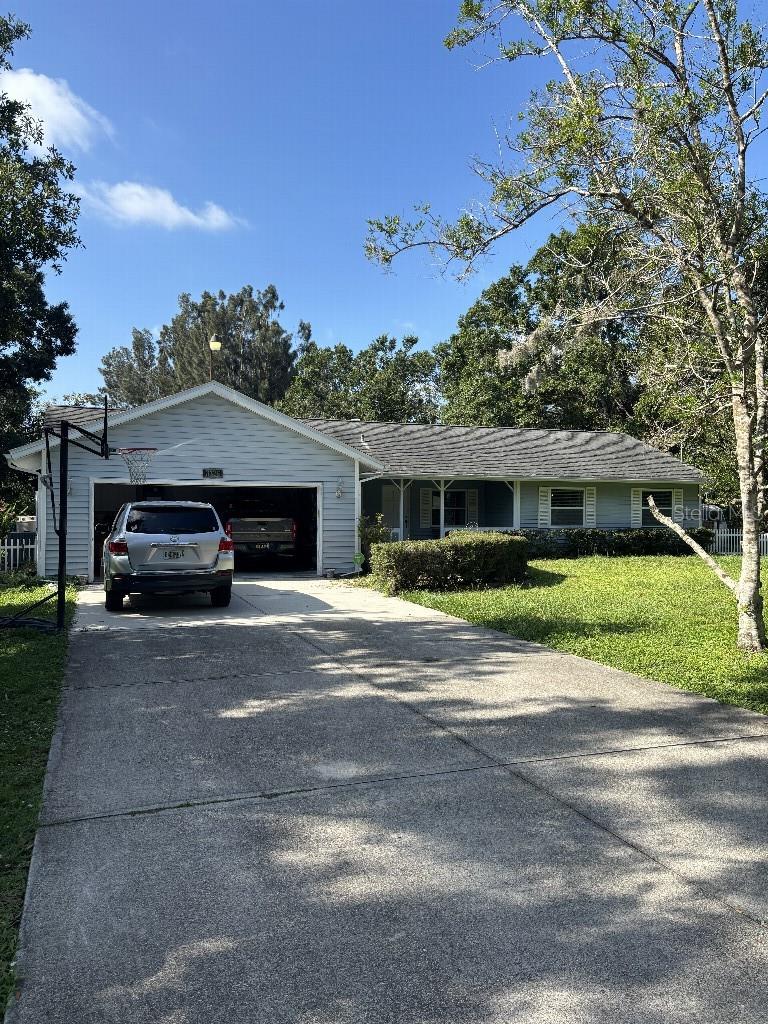 Great home with oversized lot in town, close to everything including UTC. Vaulted ceilings, 2 car garage, solar on the roof and 3/4 of acre yard with chicken coop.