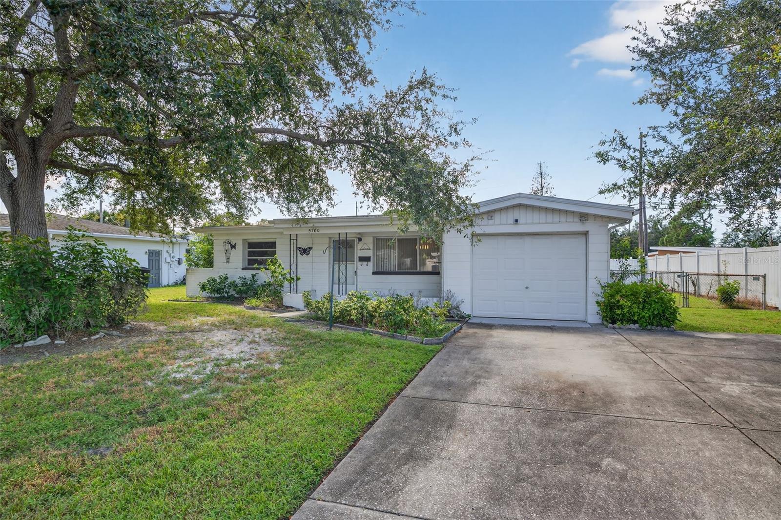 This 3-bedroom, 2-bathroom home with a spacious 1-car garage is full of potential and ready for a new owner. Inside, you’ll find classic terrazzo floors in the living room and bedrooms along with a layout that’s waiting for your personal touch. This is a great opportunity for investors or a first-time buyer looking to create a home of their own. Outside, the property features a good-sized fenced yard, perfect for pets, gardening, or entertaining. With its solid bones and plenty of room to reimagine, this home offers the chance to bring your vision to life.