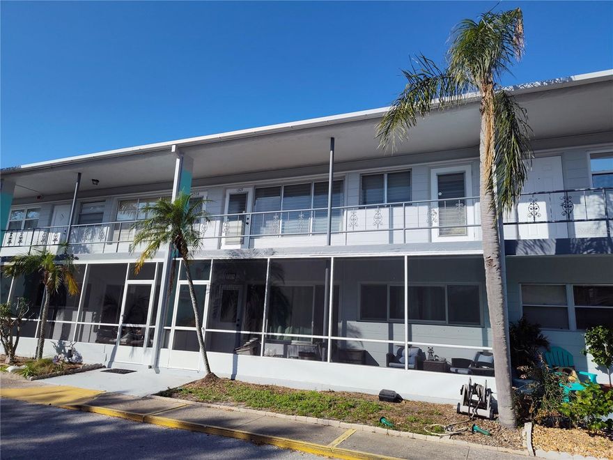 NO HURRICANE DAMAGES during 2024 to this  2-bedrooms condominium, which is located in X presently NON-EVACUATION ZONE The building is in the east end of the complex, not facing another building, and the unit features views of trees and Lanscaping on larger residential lots from your front windows, NEWER PERGO WOOD-LAMINATE FLOORING in living/dining room combo, kitchen, and both bedrooms, neutral colors of wall-paint to match with your personal furniture and decorations, NEWER WATER HEATER, NEWER toilet, WASHER AND DRYER in spacious FLORIDA ROOM, Cleaned and reconstructed the intake ductwork to the central-HVAC/AC, well-kept kitchen and bathroom, two exterior doors one to the living/dining room combo and the other exterior door to the 2nd bedroom. Not facing another building, this building offers a little more privacy than buildings in some other streets. TENTING was completed in JANUARY OF 2025. There is no land lease or land lease fee; just one fee to the association and that monthly fee to the association includes CABLE, INTERNET, Wi-Fi, water, sewer, trash removal, maintenance of the exterior common elements, and insurance of the building exterior while buyer is advised to get insurance for the interior. This PET-FRIENDLY complex located in Kenneth City is within the north-west part of St. Petersburg. Approximately 7 miles away from each Madeira Beach and St Pete Beach, this complex is located about 4 blocks east from Clearview Oaks Management Condominium Association's shuffleboard court and a clubhouse with a library, a pool-table, and a piano.