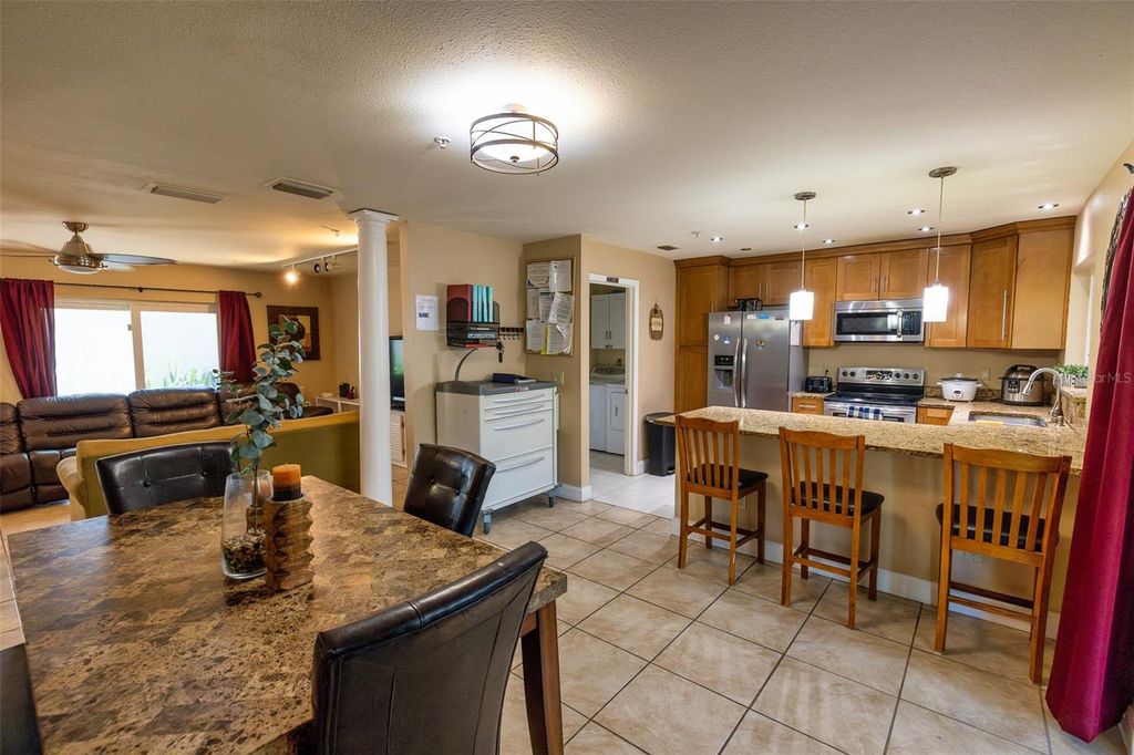 Photo of 7128 Wrenwood Circle, Tampa, FL 33617 (MLS # TB8402710)